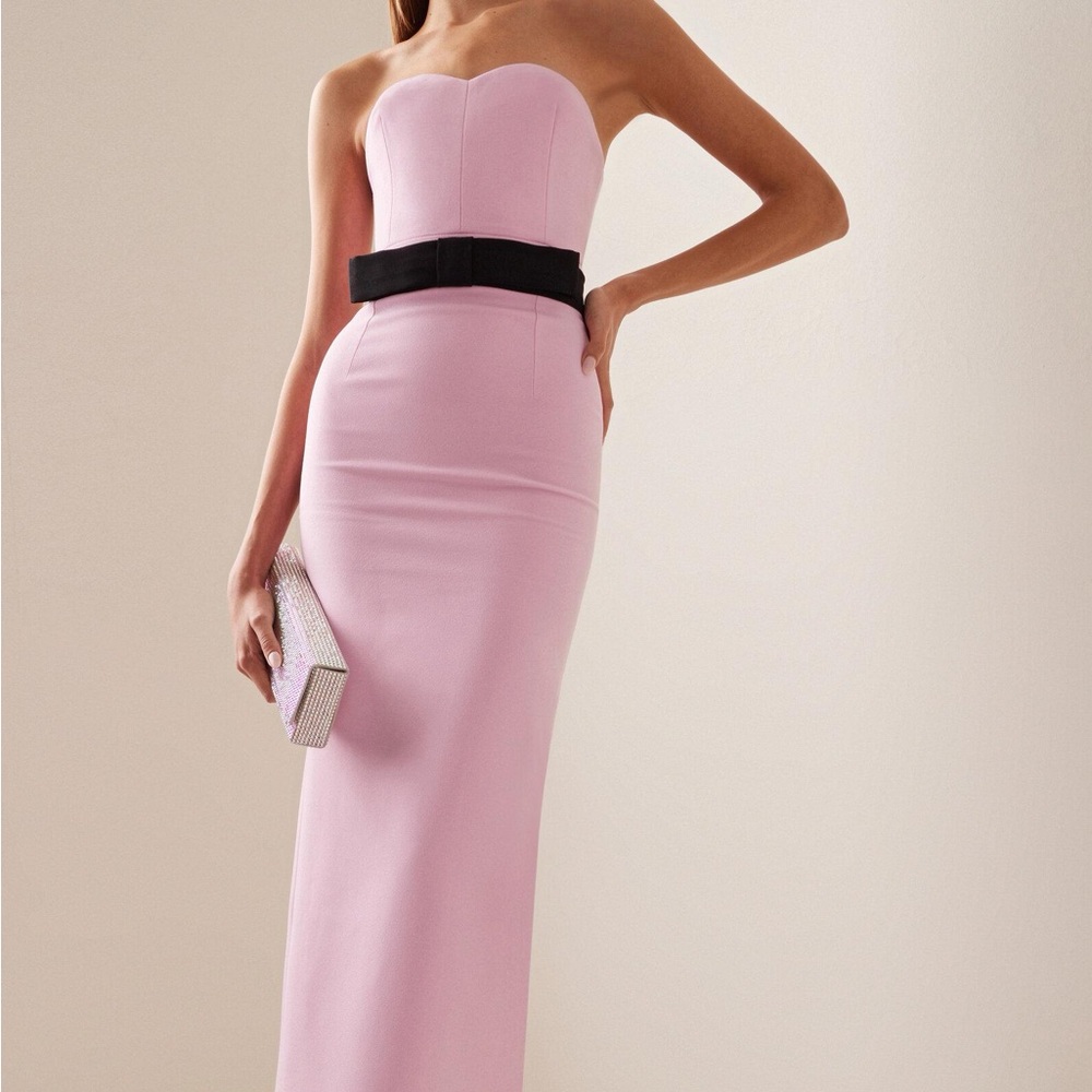 The New Arrivals pink dress with black bow around waist